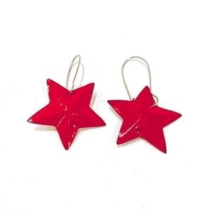 Red star earrings on hooks.